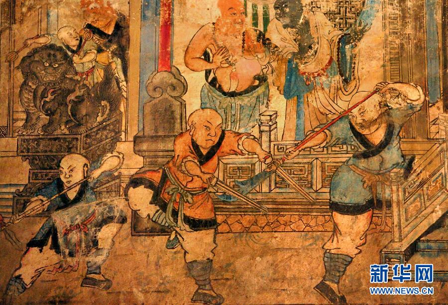 少林寺白衣殿內(nèi)的墻上表現(xiàn)少林武僧習(xí)武練拳的壁畫(局部,2005年9月15日攝)。
