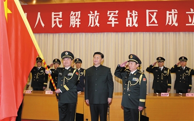 習近平將軍旗授予南部戰區司令員王教成、政治委員魏亮。