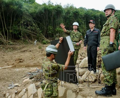 廣島泥石流遇難者增至70人 日本防衛相慰問災區