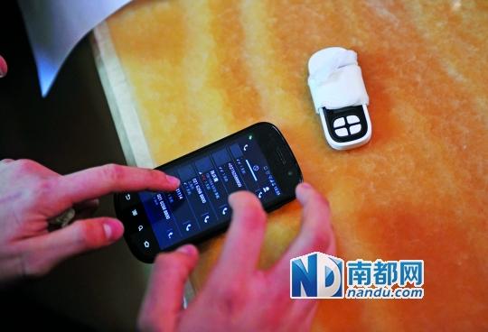 一個號碼為021-62588800的電話自稱上海靜安區公安分局，騙走了小程148萬。記者 梁煒培 攝