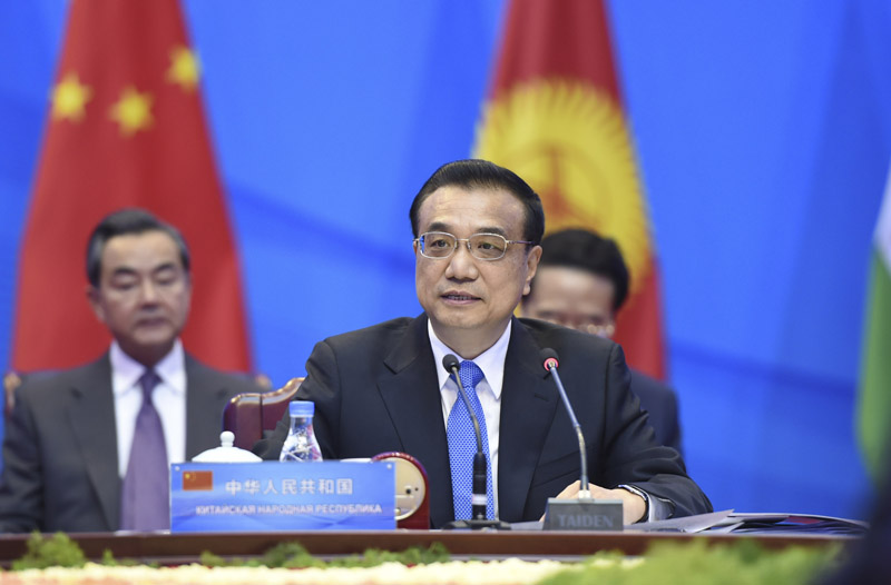 李克強總理15日上午在鄭州國際會展中心主持上合總理會小范圍會談。 李克強總理15日上午在鄭州國際會展中心主持上合總理會小范圍會談。